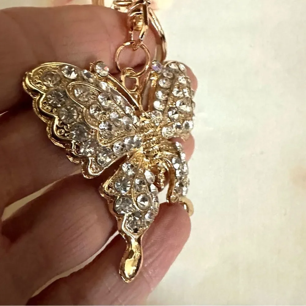 Gold tone butterfly rhinestone hang tag/keychain